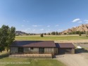 Experience maintenance-free living in this beautifully remodeled for sale in Dubois Wyoming Fremont County County on GolfHomes.com