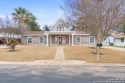 Welcome to your dream home in Devine! This stunning five-bedroom for sale in Devine Texas Medina County County on GolfHomes.com