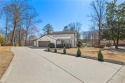 Sitting on an expansive corner lot in the prestigious Indian for sale in Marietta Georgia Cobb County County on GolfHomes.com