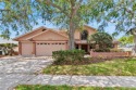 Welcome to your newly remodeled 4 bed, 2.5 bath, with 3 car for sale in Seminole Florida Pinellas County County on GolfHomes.com