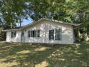 This is a must-see cozy cottage, located in Canadian Lakes with, Michigan