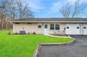 Welcome to this beautifully renovated and move-in ready Carlton for sale in Ridge New York Suffolk County County on GolfHomes.com
