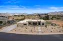 Welcome to your dream home in the highly sought-after gated for sale in Saint George Utah Washington County County on GolfHomes.com