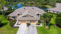 Experience serene lagoon views complemented by a soothing for sale in Naples Florida Collier County County on GolfHomes.com