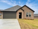 Jubilant Justin plan! Indulge in the ultimate living experience for sale in Maumelle Arkansas Pulaski County County on GolfHomes.com