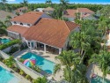 This beautiful 3 bedroom 2 bath attached villa is an oasis for sale in Naples Florida Collier County County on GolfHomes.com