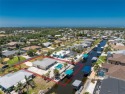 MOTIVATED SELLER! Boating, fishing, sunsets, and for sale in Englewood Florida Charlotte County County on GolfHomes.com