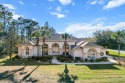 This stunning custom corner-lot home is packed with upgrades! for sale in Homosassa Florida Citrus County County on GolfHomes.com