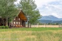 The setting of this Victor estate is magical!   At the end of a for sale in Victor Idaho Teton County County on GolfHomes.com