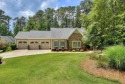 Embrace the ultimate lakefront lifestyle in this exquisite for sale in Mccormick South Carolina Mccormick County County on GolfHomes.com