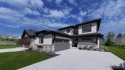 Enjoy effortless luxury in this striking two-story paired home for sale in Timnath Colorado Larimer County County on GolfHomes.com