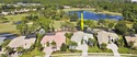 CUSTOM BUILT POOL HOME WITH GOLF & WATER VIEWS in the for sale in Port Saint Lucie Florida Saint Lucie County County on GolfHomes.com