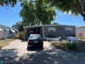 Absolutely gorgeous 2/2 double wide with carport - shed - for sale in Davie Florida Broward County County on GolfHomes.com