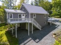 Welcome to your dream home on the 9th hole of a picturesque golf for sale in Lake Ariel Pennsylvania Wayne County County on GolfHomes.com