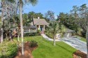 This exquisite 4-bedroom residence, nestled on a remarkable lot for sale in Hilton Head Island South Carolina Beaufort County County on GolfHomes.com