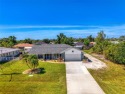 MUST SEE!  SPLIT BEDROOM PLAN!  DOUBLE LOT!  UPDATED!  HEATED for sale in Englewood Florida Charlotte County County on GolfHomes.com