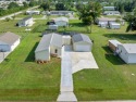 PERFECT HOME FOR YOU AND YOUR TOYS AND X FLOOD ZONE! Located on for sale in Punta Gorda Florida Charlotte County County on GolfHomes.com