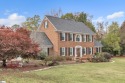 Welcome to your dream home! This stately, three-story brick for sale in Easley South Carolina Pickens County County on GolfHomes.com