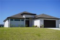 Seller Motivated!!! New home with 3 beds, 3.5 baths, and a 2-car for sale in Cape Coral Florida Lee County County on GolfHomes.com