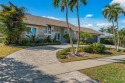 A beautifully renovated two-story masterpiece on Marco Island for sale in Marco Island Florida Collier County County on GolfHomes.com