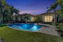 Masterfully designed, this exquisite pool home boasts the for sale in Palm Beach Gardens Florida Palm Beach County County on GolfHomes.com
