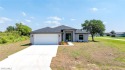 You Will Be Amazed By The Quality Of This Brand New Construction for sale in Lehigh Acres Florida Lee County County on GolfHomes.com