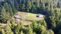 One of a kind, creek front, private, treed 7+ acre lot with a for sale in Goldbeach Oregon Curry County County on GolfHomes.com