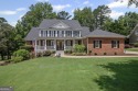 This 4-sided brick 5BR/4.5BA golf course home with a basement for sale in Newnan Georgia Coweta County County on GolfHomes.com