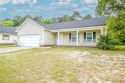Welcome to this inviting 3-bedroom, 2-bathroom home nestled in for sale in Hope Mills North Carolina Cumberland County County on GolfHomes.com