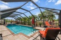 Your Private Tropical Oasis with Pool, Spa, Tiki Hut  Extra Lot for sale in Cape Coral Florida Lee County County on GolfHomes.com