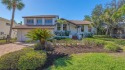 Coastal elegance meets island living in Bay Isles Bayou on for sale in Longboat Key Florida Sarasota County County on GolfHomes.com