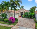 This magnificent tropical paradise, Chatam model home is located for sale in Lake Worth Florida Palm Beach County County on GolfHomes.com