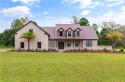 Beautiful brick home situated on nearly 3 acres in the gated for sale in Waverly Georgia Camden County County on GolfHomes.com