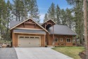 Nestled in the serene settings of Blanchard, Idaho, this custom for sale in Blanchard Idaho Bonner County County on GolfHomes.com