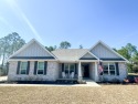If you love space, technology, natural window light, high for sale in Freeport Florida Walton County County on GolfHomes.com