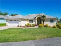MUST SEE!  This is a Monterey model concrete block and stucco for sale in Summerfield Florida Marion County County on GolfHomes.com