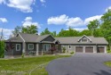 THIS IS LIVING! Stunning custom-built newer contemporary ranch for sale in Lake Harmony Pennsylvania Carbon County County on GolfHomes.com