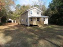 Charming Starter Home or Cozy Getaway! Welcome to this for sale in Arapahoe North Carolina Pamlico County County on GolfHomes.com