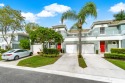 Immerse yourself in the epitome of South Florida living with for sale in Lake Worth Florida Palm Beach County County on GolfHomes.com