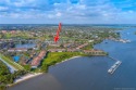 Discover waterfront living at its finest in this beautifully for sale in Stuart Florida Martin County County on GolfHomes.com