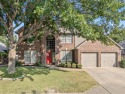 Situated on the 16th tee box of The Golf Club at Fossil Creek for sale in Fort Worth Texas Tarrant County County on GolfHomes.com