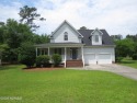 This lovely low country home is located in Winding River for sale in Bolivia North Carolina Brunswick County County on GolfHomes.com