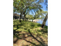 Welcome to your fully furnished waterfront community townhome for sale in Navarre Florida Santa Rosa County County on GolfHomes.com