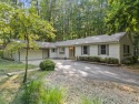 You CAN have it all!  Live in a beautifully updated, spacious for sale in Canadian Lakes Michigan Mecosta County County on GolfHomes.com