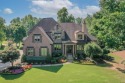 SOPHISTICATED GOLF COURSE HOME IN WOODMONT G & CC!  Former for sale in Canton Georgia Cherokee County County on GolfHomes.com