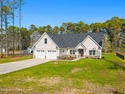 Stunning custom 3 bedroom, 3 bathroom plus a bonus room home in for sale in Calabash North Carolina Brunswick County County on GolfHomes.com