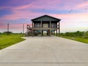 Welcome to your coastal paradise! This stilted beach-style for sale in Rockport Texas Aransas County County on GolfHomes.com