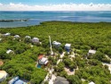 Oversized corner lot on gorgeous North Captiva Island with bay for sale in North Captiva Island Florida Lee County County on GolfHomes.com