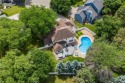 Nestled in a private cul-de-sac across from Prestwick Golf Club for sale in Woodbury Minnesota Washington County County on GolfHomes.com