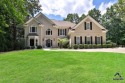 Discover sweeping views of Royal Lakes Golf & County Club's 1st for sale in Flowery Branch Georgia Hall County County on GolfHomes.com